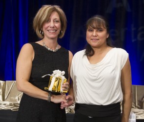 Cindy Lee Auger (right) receives the President’s Award 