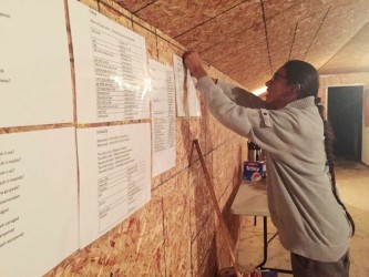 Preston Pine is at home-at work in an Anishinaabe Wiigwaam (Anishinaabe Language