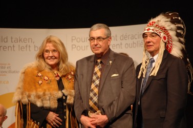 Westaskiwin Mayor and former teacher Bill Elliot (centre) was inducted as an hon