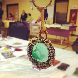 A beaded condom keychain created during a Native Youth Sexual Health Network 