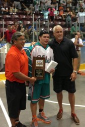 Cody Jamieson is presented with the MVP award at the Mann Cup championship final