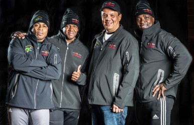 Chief Vern Janvier (second from right)with Jamaican Bobsled Team