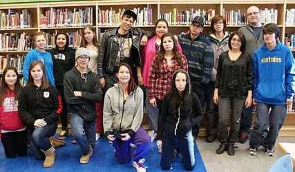 Slam poetry performer Zaccheus Jackson Nyce (fourth from left backrow) was struc