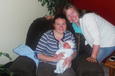 Tamar Quist, with baby Peter and his mom, became the first midwife to work in Al