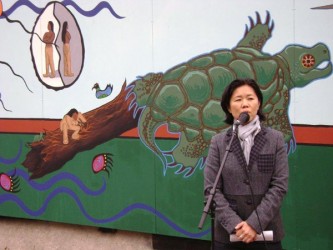 Toronto City Councillor Kristyn Wong-Tam in front of All My Relations mural