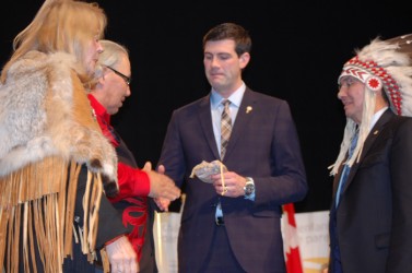 Edmonton Mayor Don Iveson shakes hands with TRC Chair Justice Murray Sinclair as