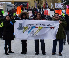 Gary Moostoos (far right), in front of Edmonton City Centre.