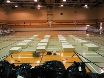 The remains in gymnasium await their final resting place