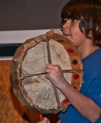 A young Aboriginal drummer from Piitoayis Family School was one of many to take 