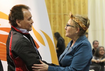 Survivor Gregory Wright speaks with Truth and Reconciliation Commissioner Marie 