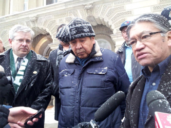 Charlie Angus (left), Andrew Wesley (centre) and Ed Metatawabin (right) address 