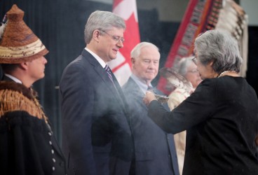 Chief Shawn Atleo, PM Stephen Harper during smudge ceremony