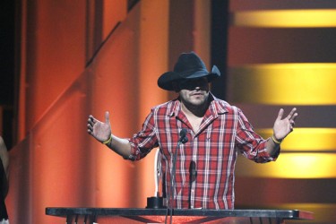 Shane Yellowbird accepts award