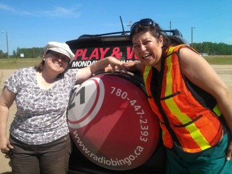 CFWE Radio’s Bingo Manager Anna Giles (left) with Donna at Red Earth Creek