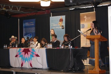 Organizer Shalene Jobin (podium) at U of A Idle No More panel