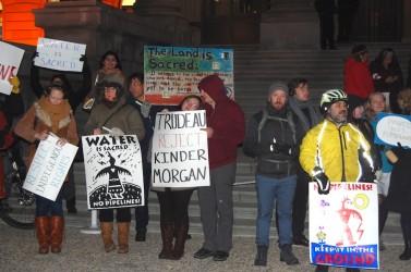 About 50 people gathered outside the Alberta Legislature