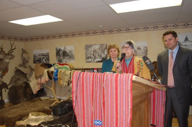 Métis Nation of Alberta president Audrey Poitras is flanked by lawyers Jean Teil
