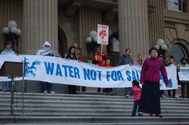 Idle No More co-founder Shannon Houle marches on the steps of the Alberta Legisl