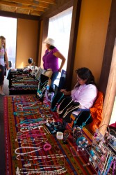 Jessie (left) and Doris Iron Shirt display the wares of the family-owned busines