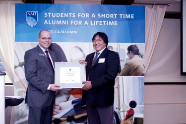 Patrick Machacek (left), NAIT’s associate vice president of advancement and comm
