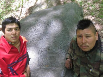 Richard Peters and Johnny Hawk set up Oshkimaadziig Unity Camp at Counsel Rock i