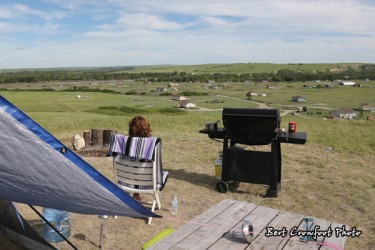 Homeowners camp overlooking their flood damaged homes