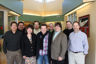 Theo Fleury (centre front row) with Tyler White (first on left back row)