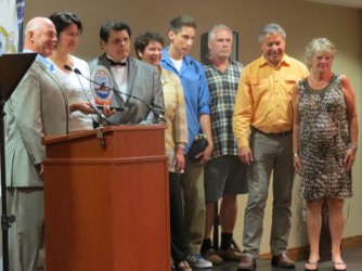 Above: Grand Chief Konrad Siouï hands a plaque honouring Kiowarini to Francine (