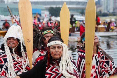 Salish canoe flotilla at Vancouver's False Creek