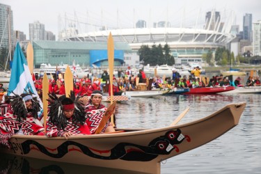 Salish canoe flotilla at Vancouver's False Creek