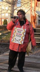 Taz Bouchier, addresses a crowd during a labour-related event on Whyte Avenue