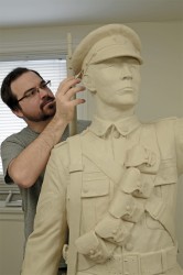 Tyler Fauvelle works on his sculpture of Francis Pegahmagabow