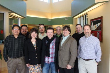 Theo Fleury with the staff at the the Siksika Health Centre.