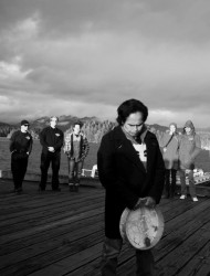 Joe Martin of the Tla-o-qui-aht First Nation leads people during a candlelight v