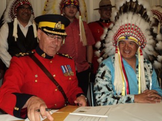 FSIN Vice Chief Bobby Cameron (R) and RCMP Assistant Commissioner  Russ 