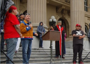Alberta Regional Chief Cameron Alexis (with microphone), of the AFN