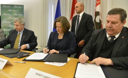 Premier Alison Redford, flanked by Minister Robin Campbell 