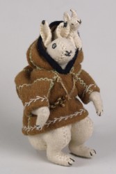 “Hare” packing doll with the baby hare peaking out from the padded hood. 