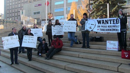 People gathered on Churchill Square to protest the promotion of police officer M