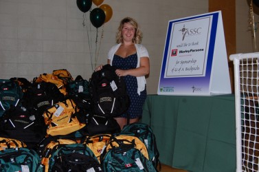Ashley Deschambault with 250 goodie-filled backpacks