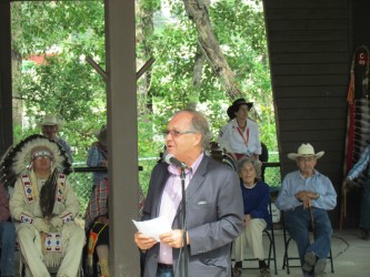 Aboriginal Affairs Minister Bernard Valcourt participate in the Grand Entry poww