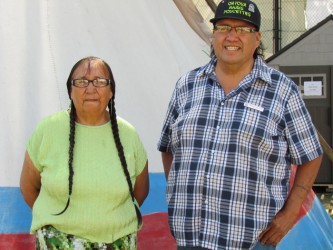 Annie Wesley and her brother Marvin Bigstoney participate in Indian Village at t