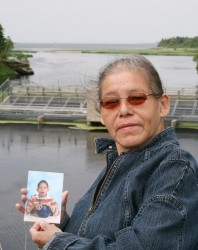 Maurina Beadle holds a picture of her son Jeremy.