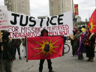 The women sing during the shutdown of Toronto’s Lakeshore Boulevard on March 22 