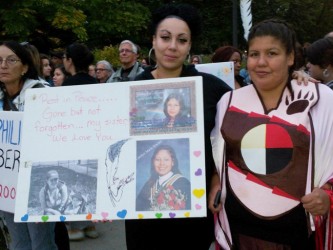 Christina Davis with a friend at the Toronto Vigil remembering her sister 