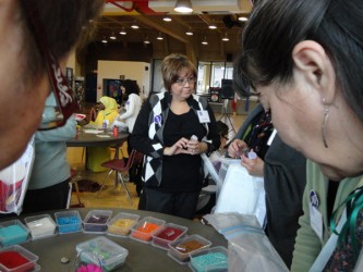 Executive Director Jori Hunter talks to women of the Somali community during a c