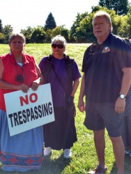 Protestors Corinne Tooshkenig and Marie Short with Chief Dan Miskokomon of Walpo