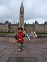 Slade Peltier holder photo of his great-grandfather David Peltier