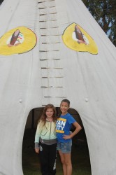 Adrianna Riley-Sinclair,10, (left) and Maddie Noon,10, hang out at one of the ti
