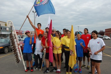 Trini Minde started carrying the Eagle Staff. Also taking turns were Daniel Ostr